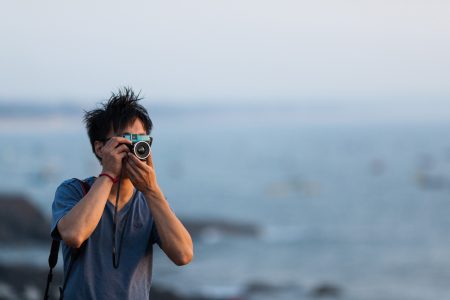 Photographer Using Camera