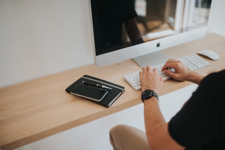 Man On Computer Typing