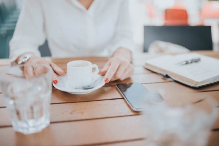 Woman Drinking Espresso Coffee