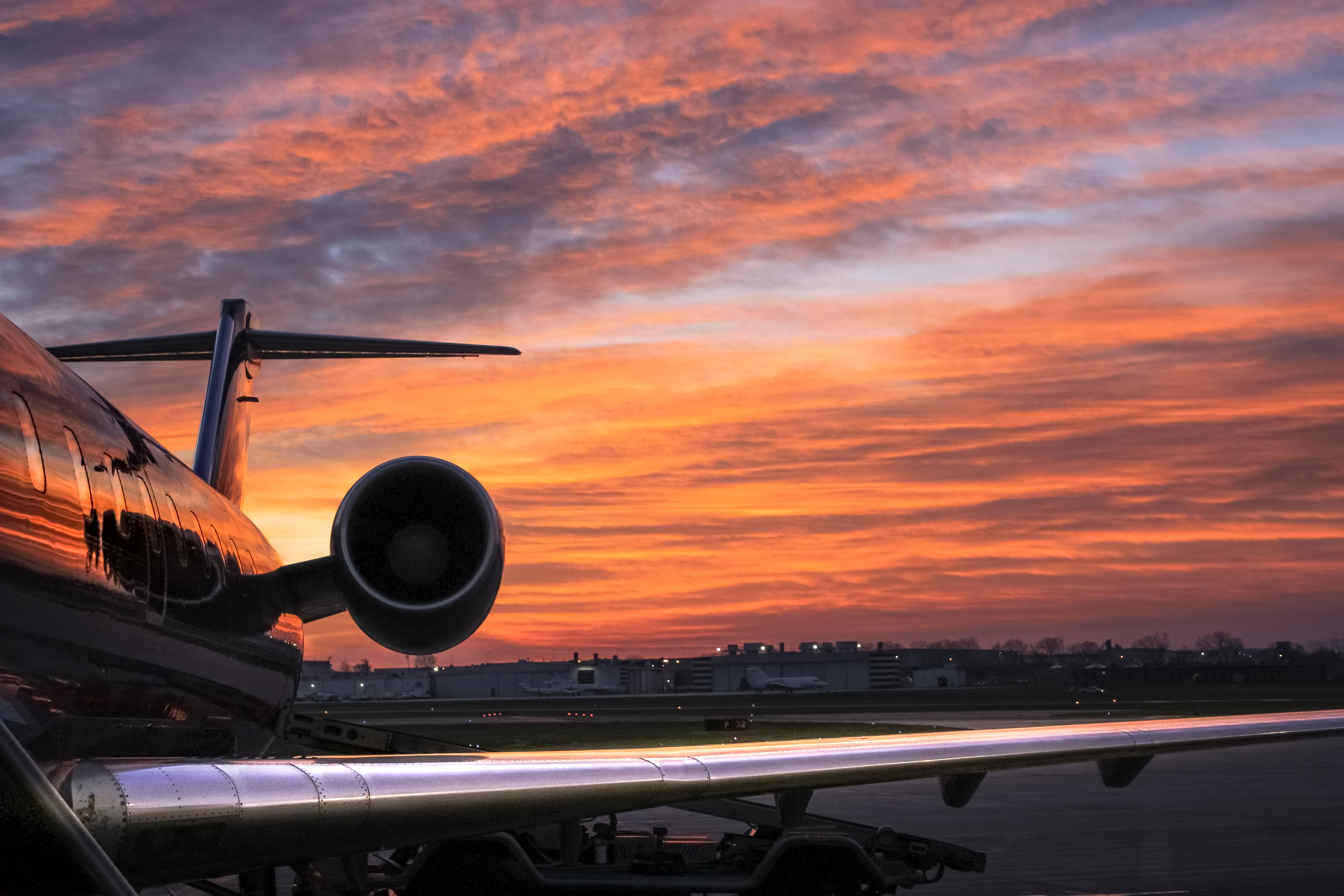 Airplane At Sunset Royalty Free Stock Photo