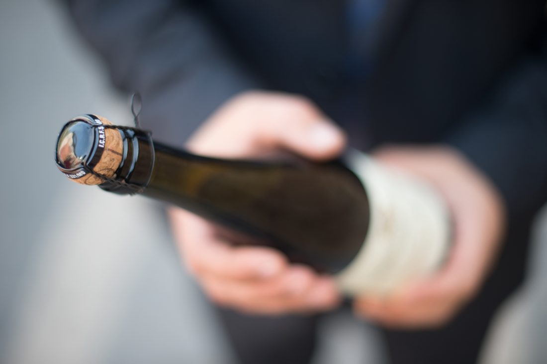 Free stock image of Man Holding Champagne Wine