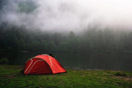 Camping by Foggy Forest in Red Tent