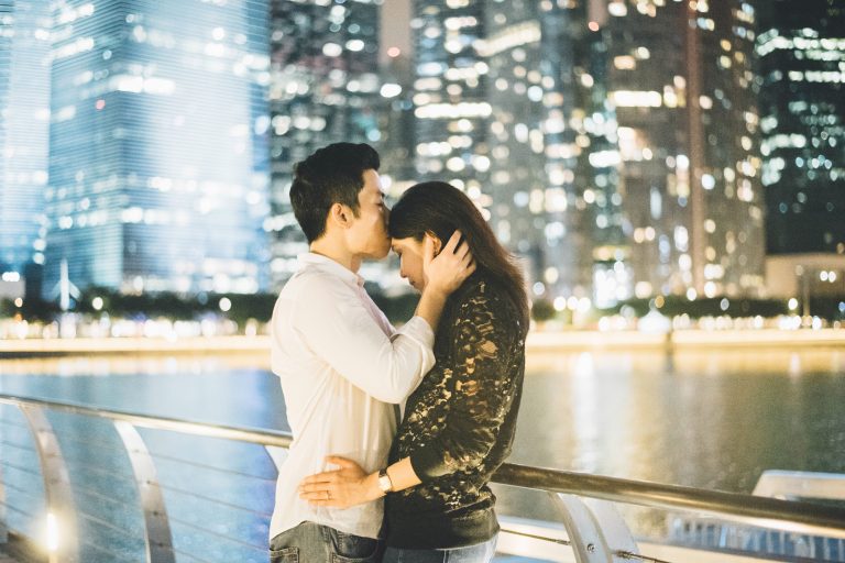 Couple Sitting Holding Hands Royalty-Free Stock Photo