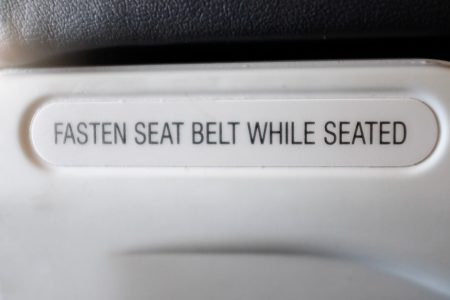 Fasten Seat Belt Sign on Plane