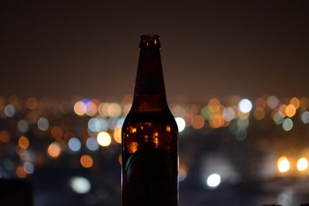 Beer Bottle in City