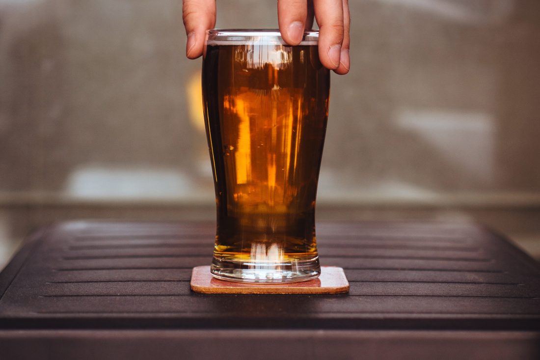 Free stock image of Man Holding Beer Glass
