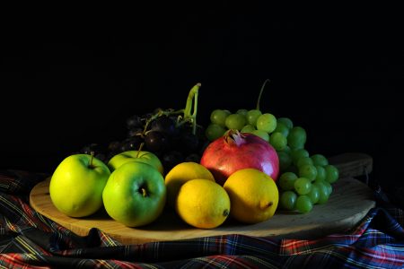 Platter of Fruit with a Black Background