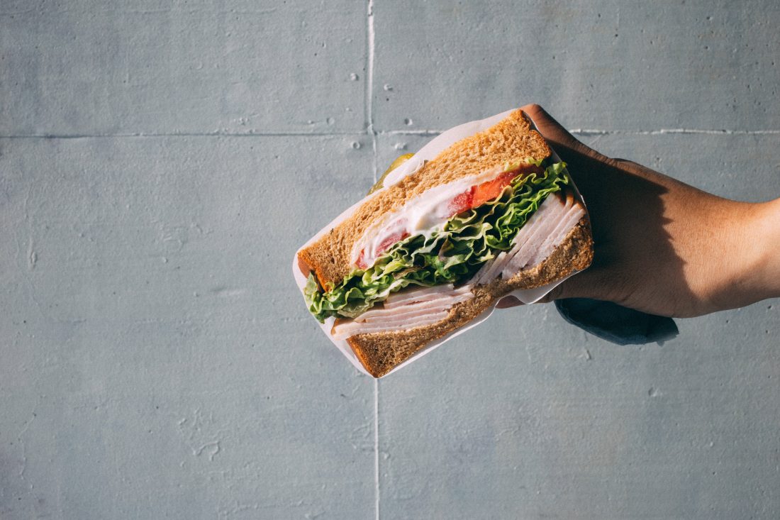 Free stock image of H& Holding Bread S&wich