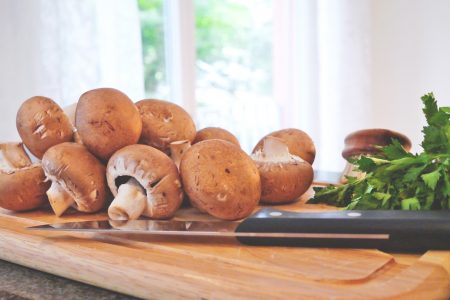 Mushrooms on Chopping Board