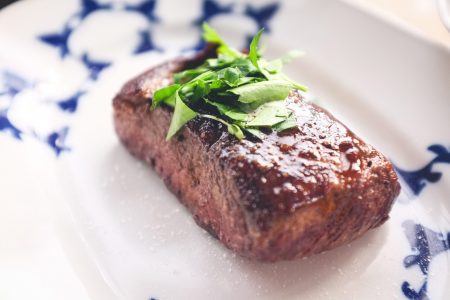 Steak on White Plate