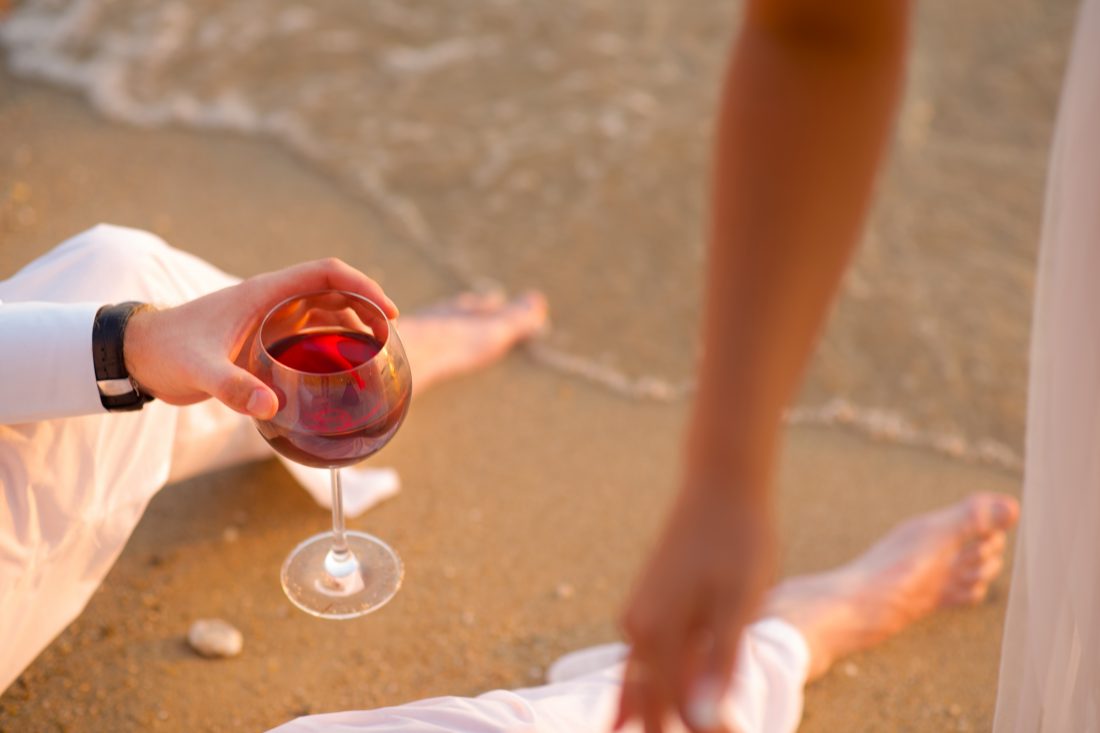 Free stock image of Couple Drinking Wine on Beach