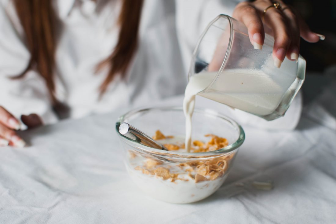 Free stock image of Woman with Breakfast Cereal