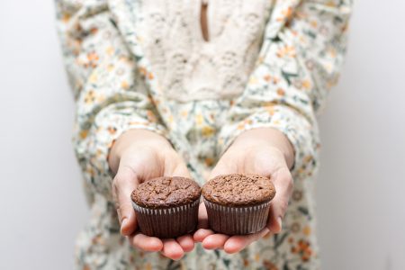 Woman Holding Cakes