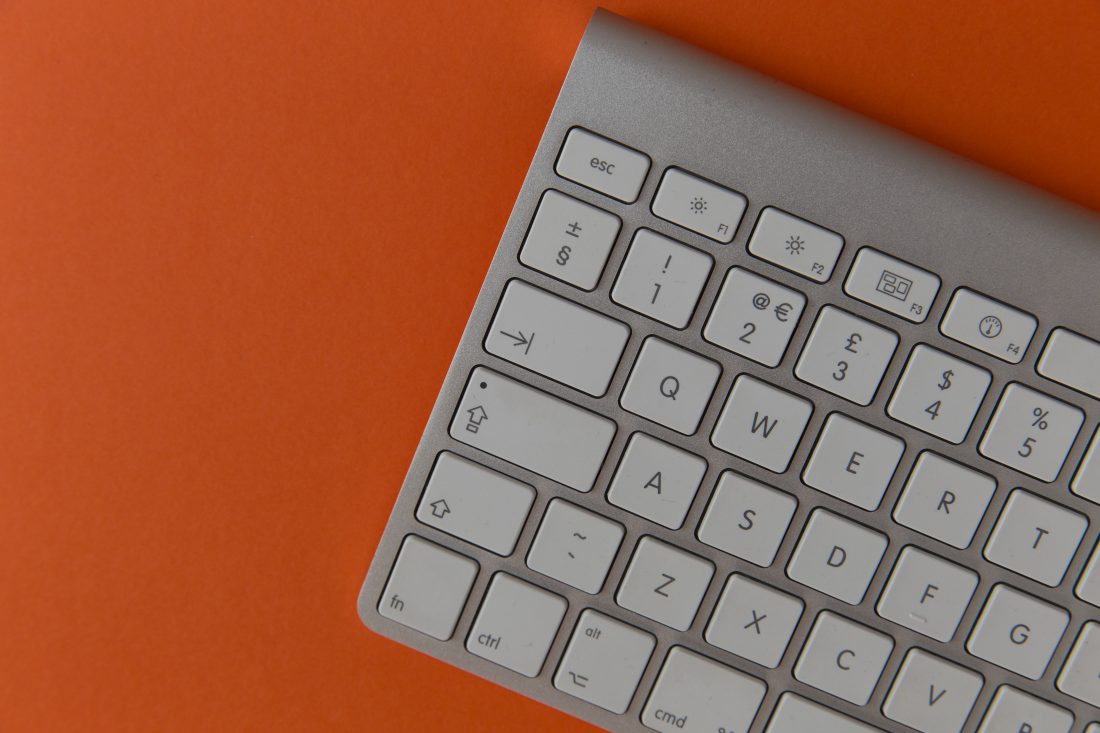 Keyboard On Orange Background