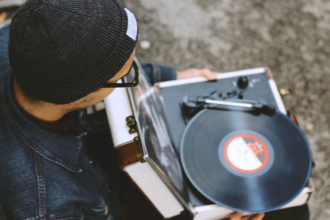 Free stock image of Man with Record Player