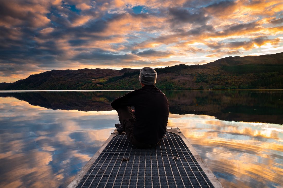 Free stock image of Man Sitting By Lake
