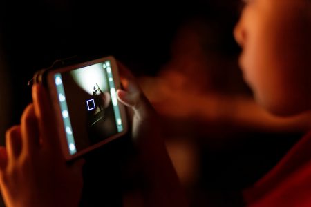 Child Using Mobile Phone