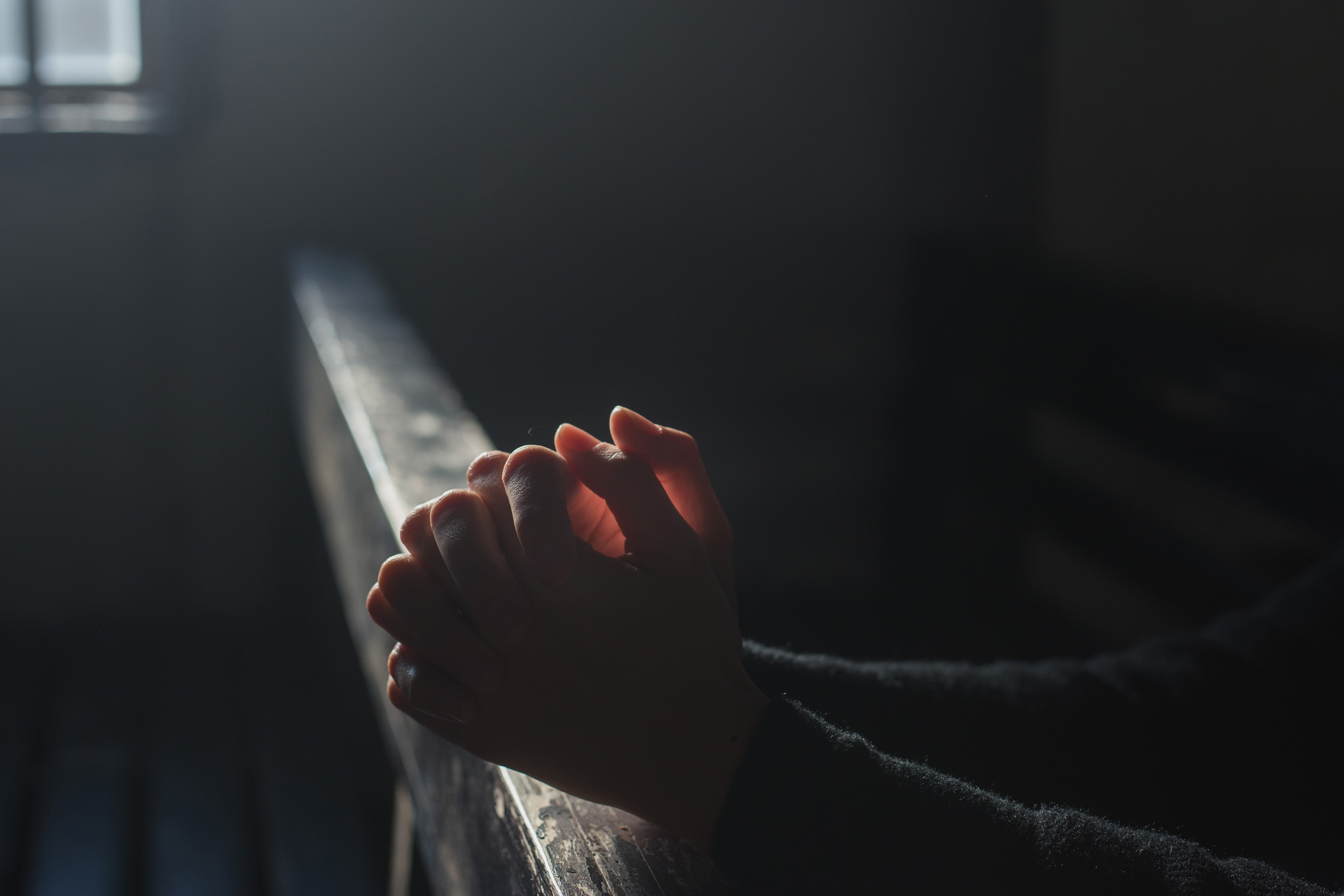Hands Praying in Church Royalty-Free Stock Photo and Image