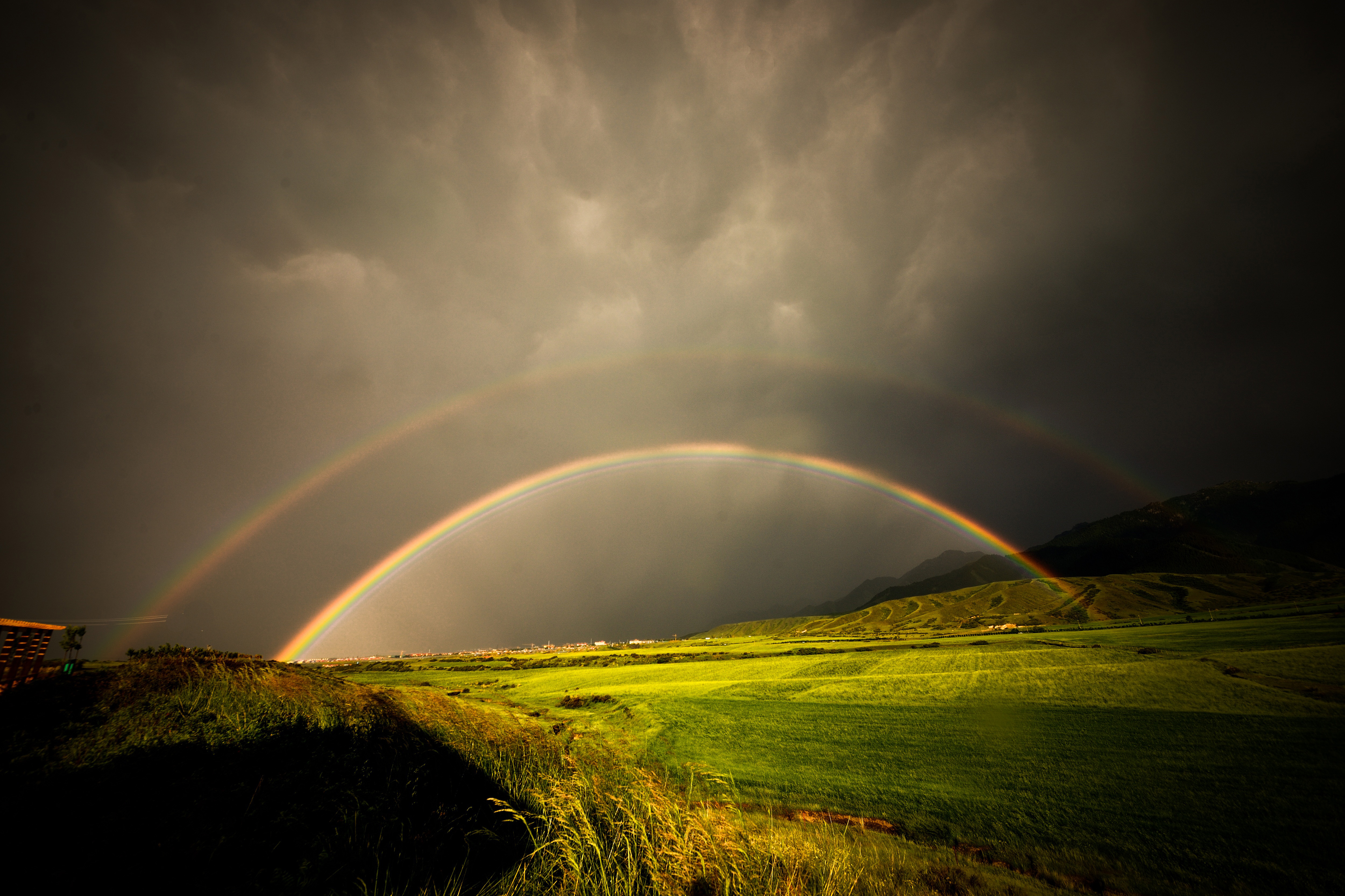 rain storms with rainbow