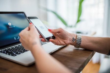 Woman on Mobile & Computer