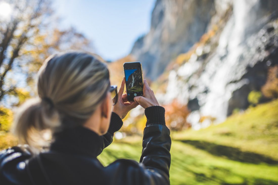 Free stock image of Woman Taking Mobile Photograph