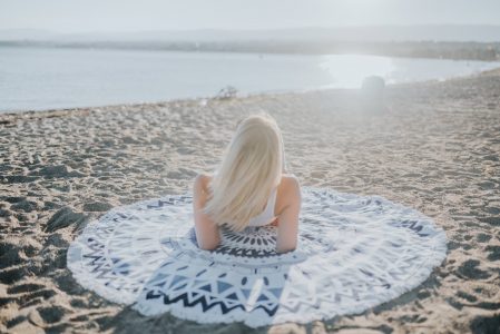 Woman on the Sand at the Beach