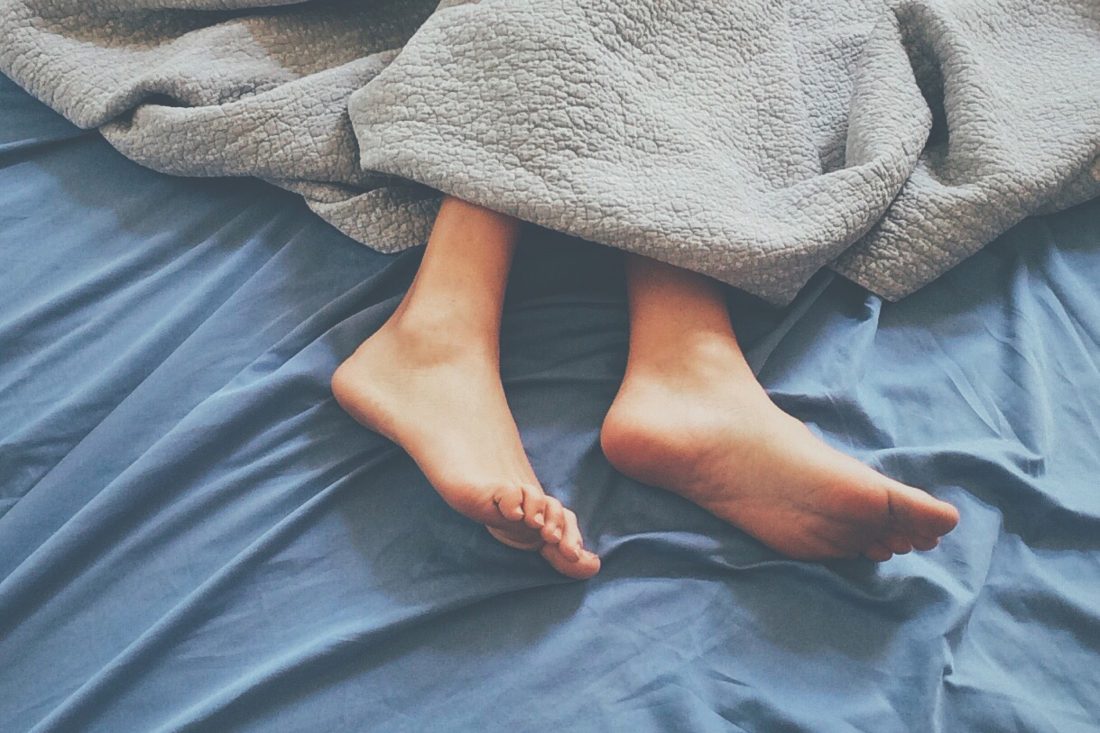 Free stock image of Sleeping Feet in Bed