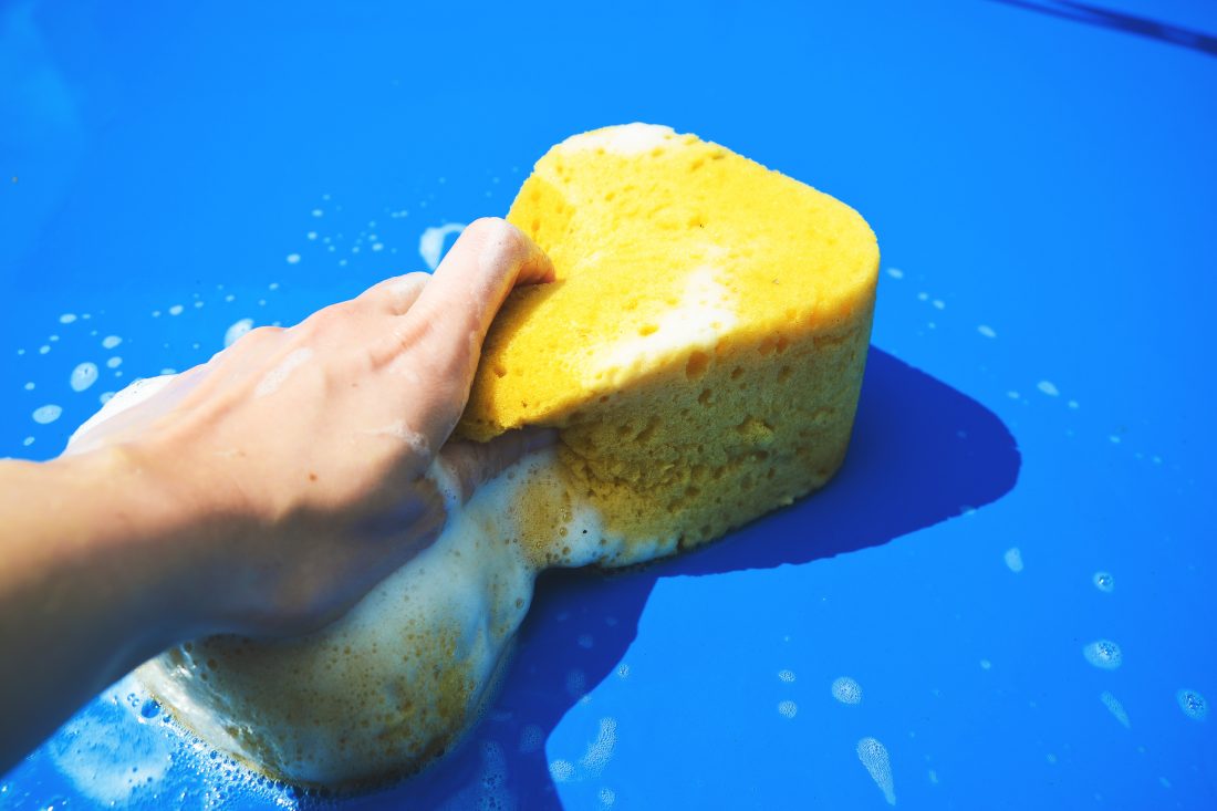 Washing Car with Sponge