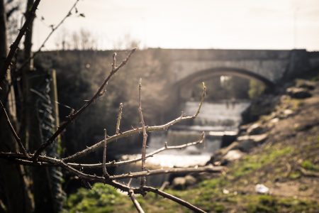 Stone Bridge Over River