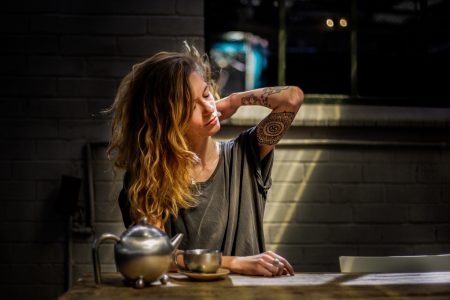 Woman With Tattoo & Long Hair