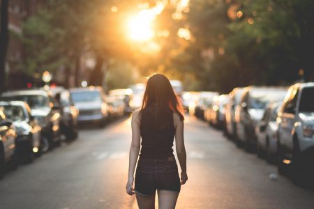 Woman Walking In City