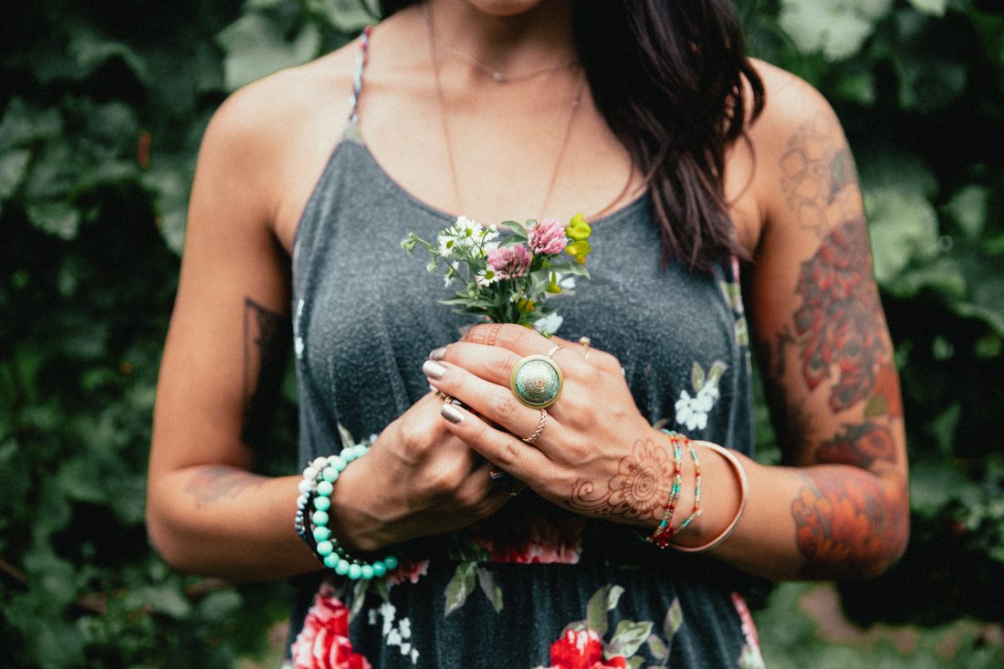 Free stock image of Woman Holding Flowers