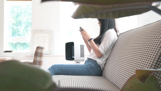 Woman Texting on Mobile