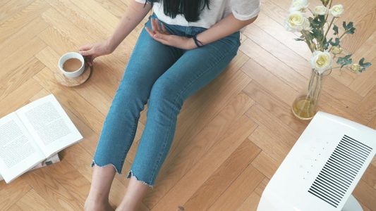 Woman Sitting on The Floor