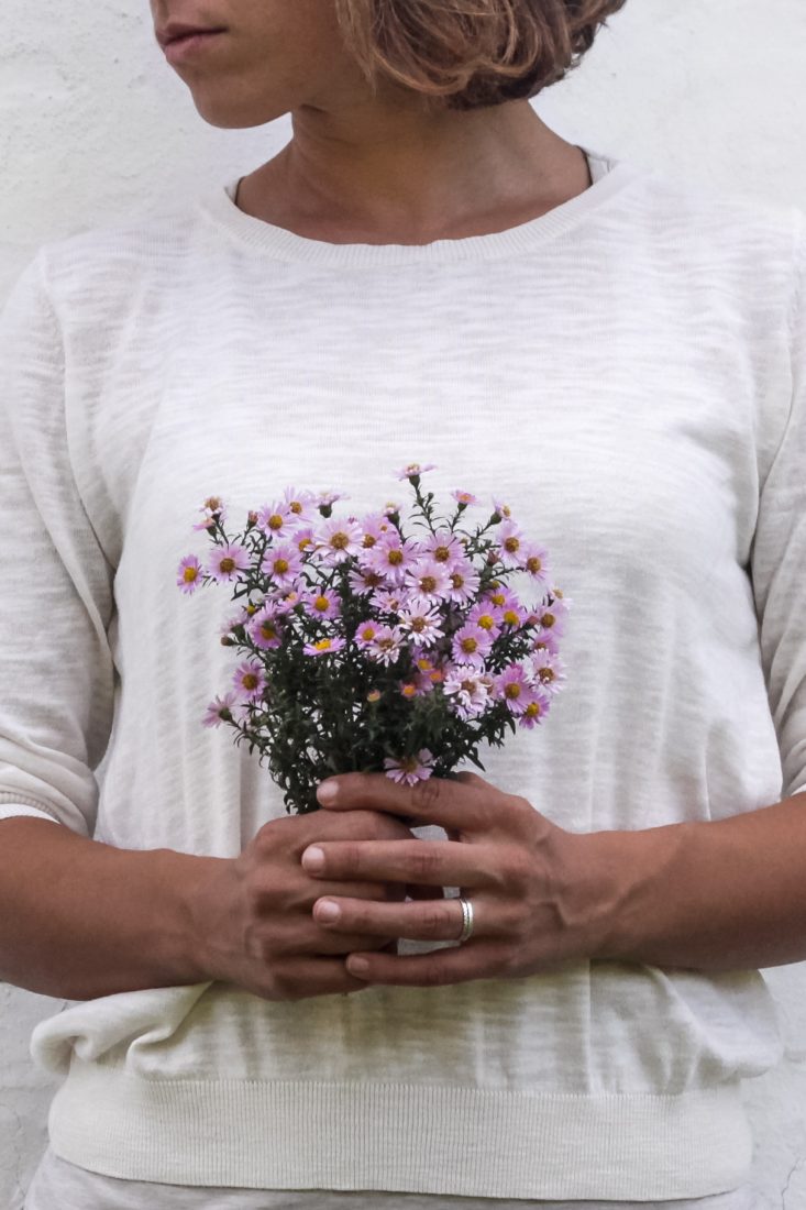Woman Holding Flowers Bouquet