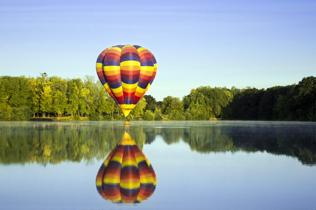 Free stock image of Hot Air Balloon Over Lake