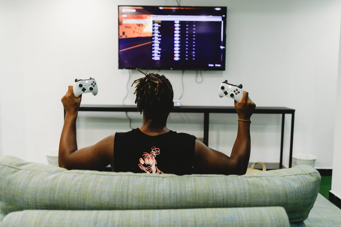 Free stock image of Man playing video game