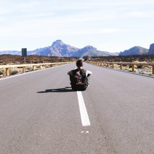 Man in Road and Mountains