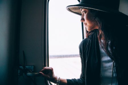 Woman Looking out Window