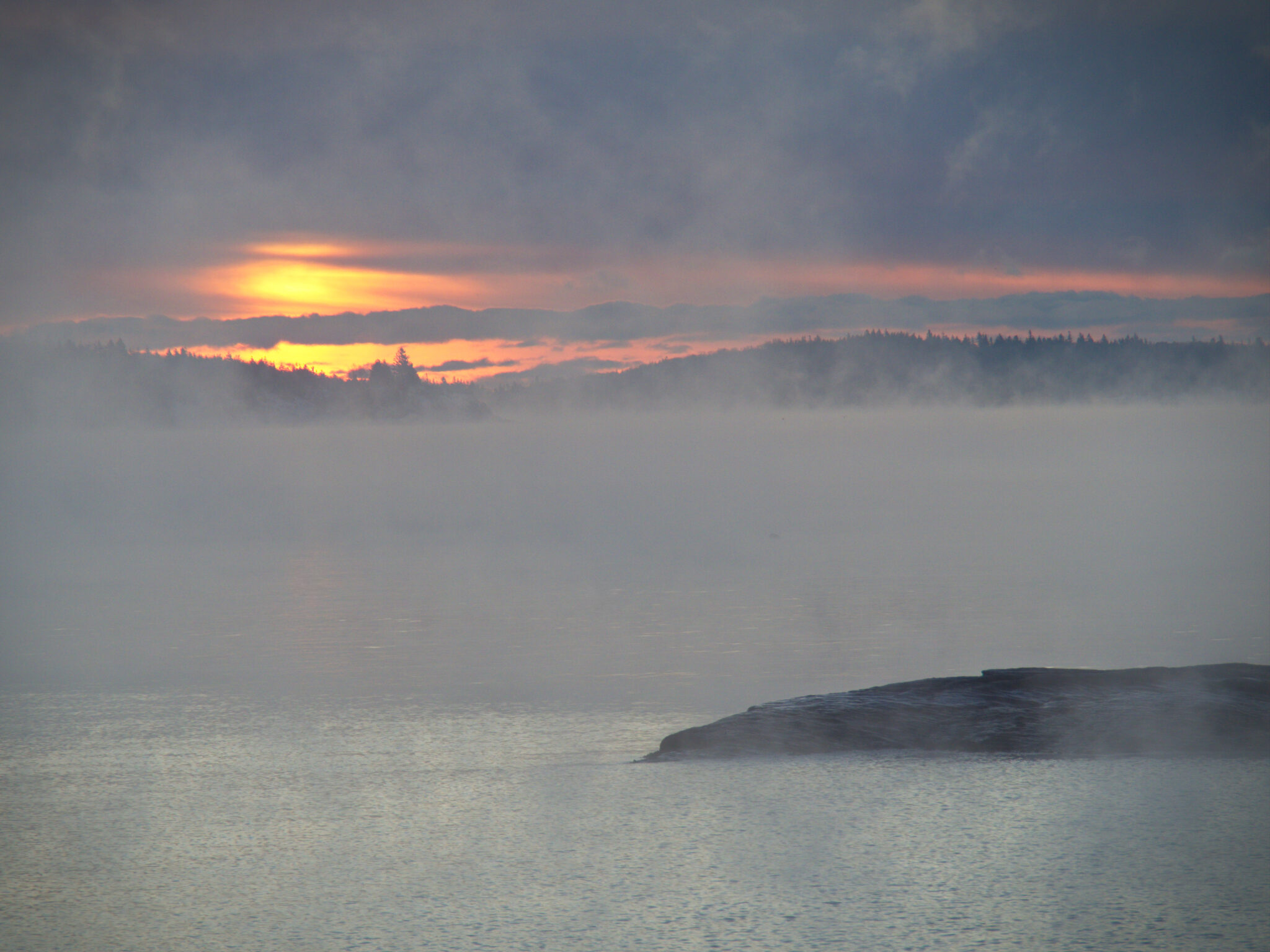 foggy-sunrise-water-royalty-free-stock-photo