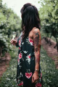 Woman Holding Wine
