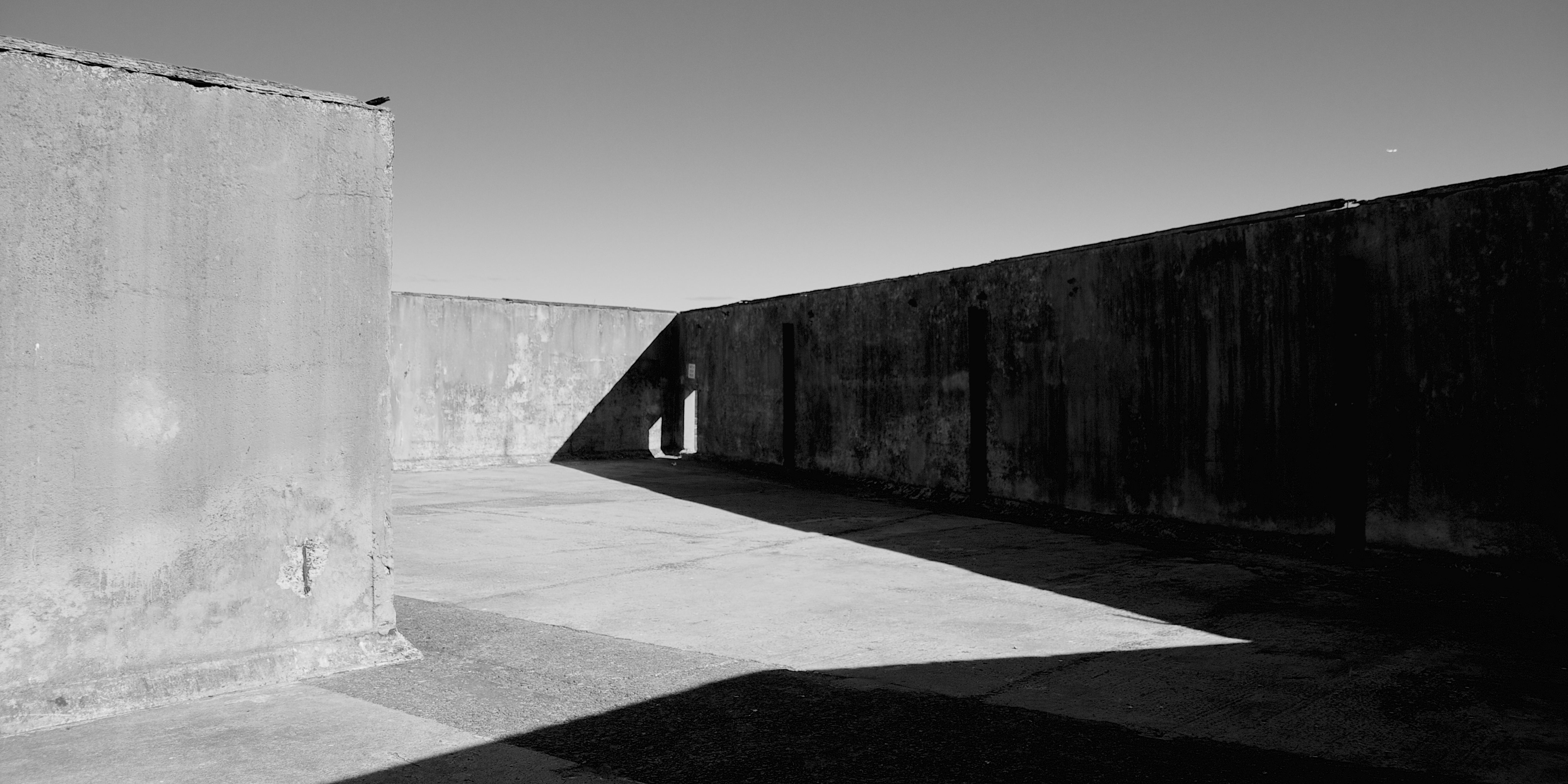Concrete structure. Black and White Light and Shadow structure. Brick Industrial facades.