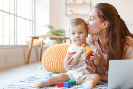 Mother Kissing Baby